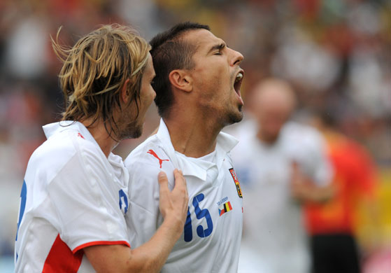 Football round the globe: Milan Baros celebrates after scoring