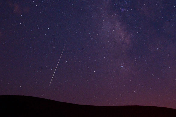 Perseid meteor shower: A Perseid meteor streaks across the sky in Vinton, US