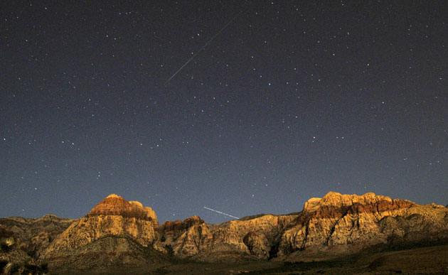 Perseid meteor shower: A Perseid meteor and the trail of an jet airplane 