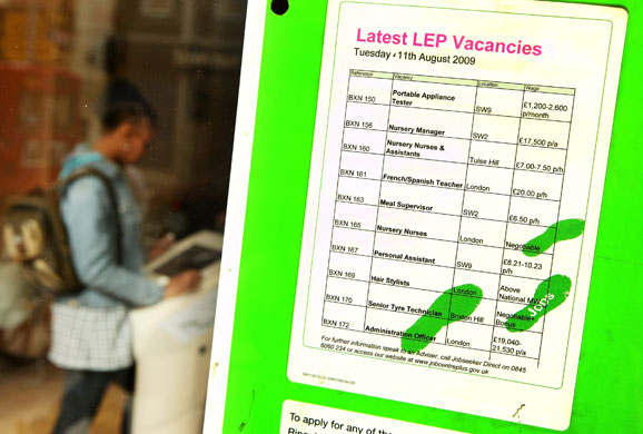 Week in Business: Available jobs are advertised at a branch of the Jobcentre Plus in London. 