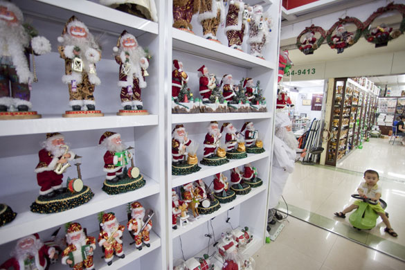 Christmas production line: Santa figures for sale at the Yule Sun Factory wholesale store in Yiwu