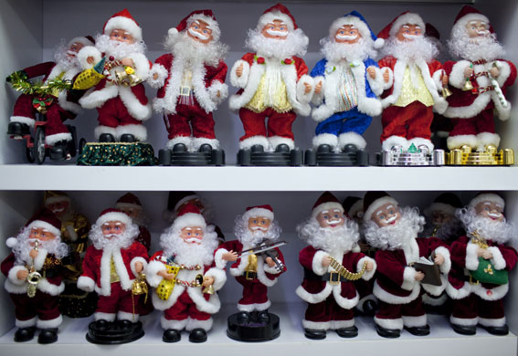 Christmas production line: Musical Santa figures for sale at the Yule Sun wholesale store in Yiwu 