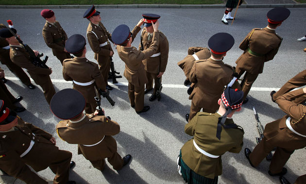 14 August 2009: Harrogate, UK:  Junior Soldiers check each others dress