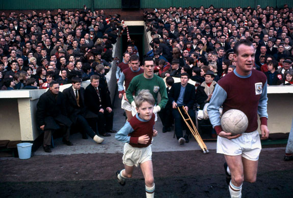 Burnley Premier League: The Burnley team take to the Turf Moor pitch.
