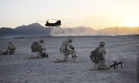 A Chinook helicopter approaches British troops during Operation Tyruna in Afghanistan