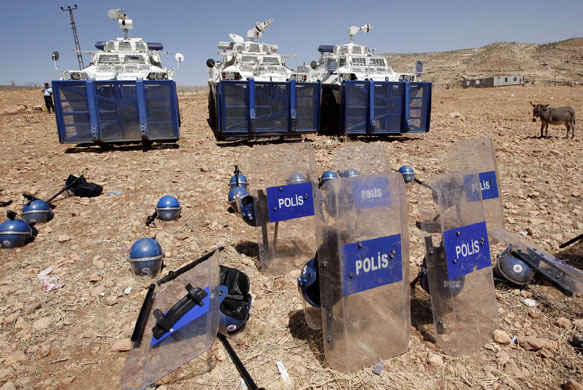 24 hours in pictures: Eruh, Turkey: Police vehicles parked during a cultural festival