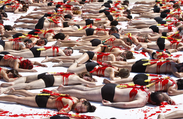 24 hours in pictures: Bilbao, Spain: NGO Equanimal activists stage a protest against bullfights