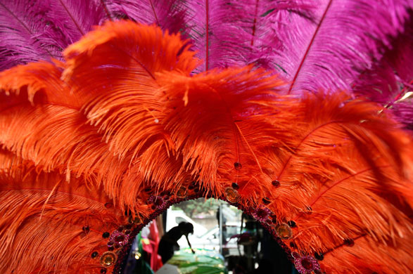 24 hours in pictures: London, England: Costume preparations for the annual Notting Hill carnival 