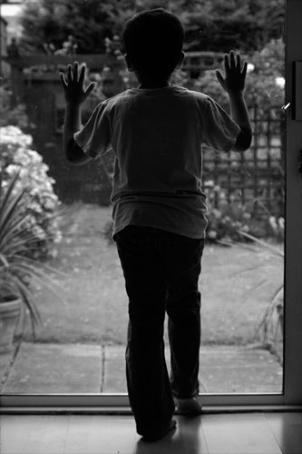 jenquest assignment: Child looking out of the window