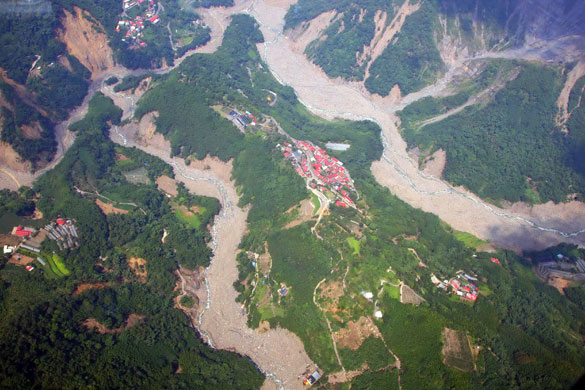 18 August 2009: Chiayi county, Taiwan: Houses engulfed by landslides