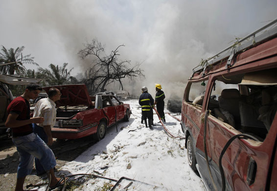 Car bombs in Baghdad: Firefighters respond to a bombing near the Foreign Ministry