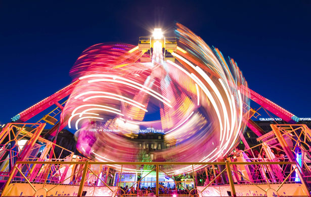 24 hours in pictures: Geneva, Swizerland: The 'Chaos' funfair ride at the Fetes de Geneve