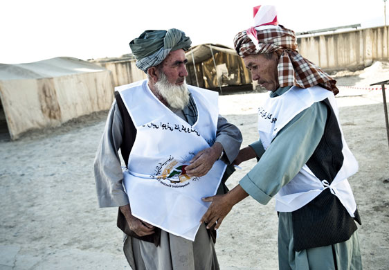 Elections in Afghanistan: Campaign staff at a poling station in Mazar-e-Sharif