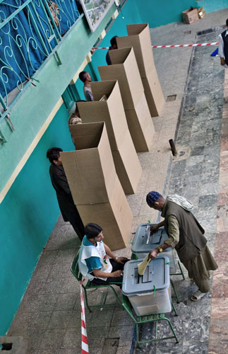 Elections in Afghanistan: Men vote at a polling station in Kabul