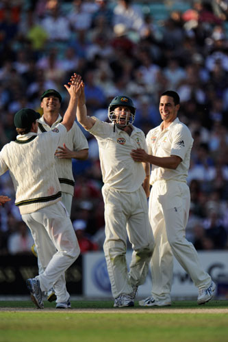tom ashes day 2: Simon Katich celebrates catching Ian Bell off Johnson