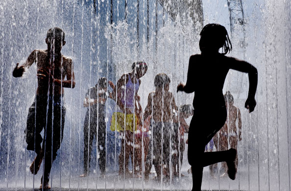 Eyewitness: Children play in the fountains outside the Hayward Gallery