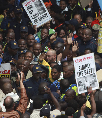 Caster Semenya: Caster Semenya is escorted by police 