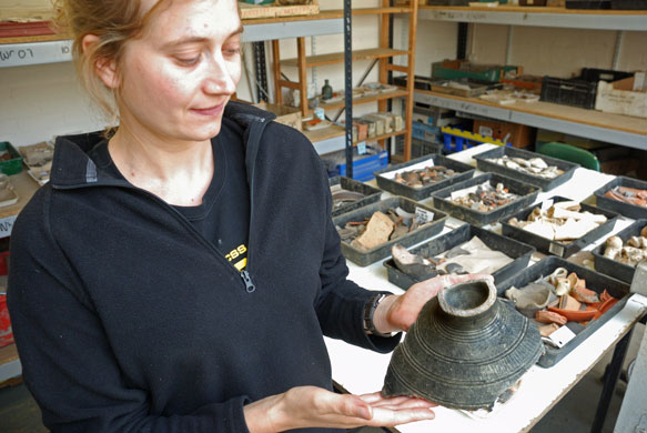 Summer digs: Ilanith Pongolini with finds from North West Cambridge site