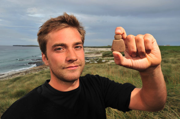 Summer digs: Jakob Kainz with his discovery of country's first known face