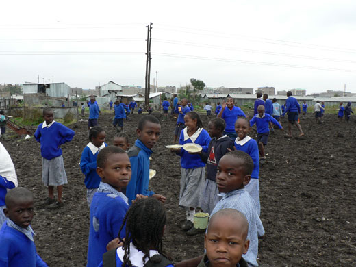 Kenya food crisis: Breaktime: children eat and play at school