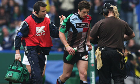 Harlequins Tom Williams leaves the pitch with fake blood dripping from his mouth
