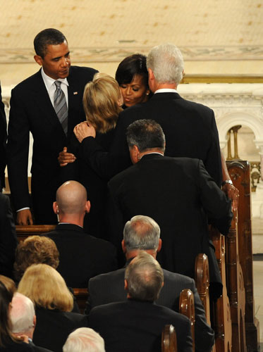 Edward Kennedy funeral: US First Lady Michelle Obama greets Secretary of State Hillary Clinton