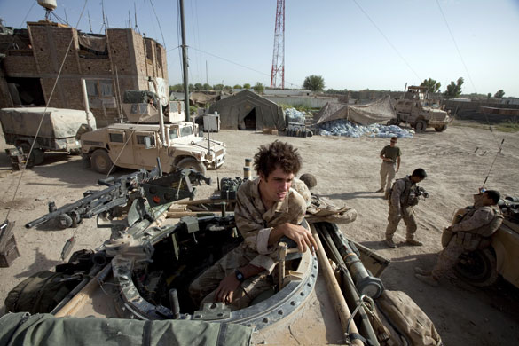 Sean Smith Helmand: A British soldier sits on a vehicle at FOB Jakers