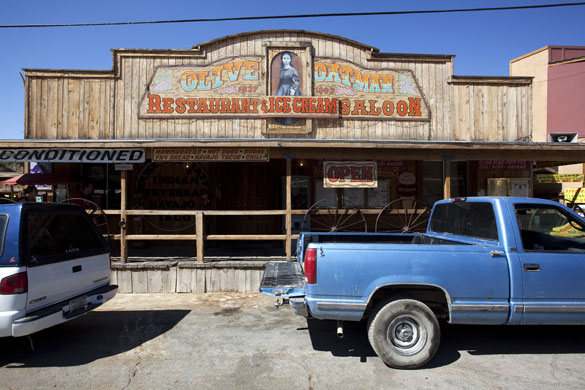 Route 66 Day 4: Trucks parked outside Olive Oatman's Ice cream saloon in Oatman, Arizona