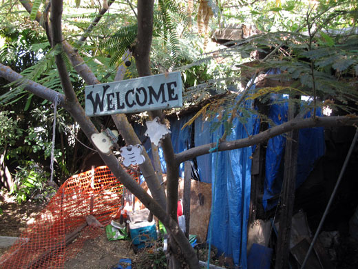 Jaycee Dugard kidnapping: A painted Welcome sign and wind chimes on a tree in the backyard