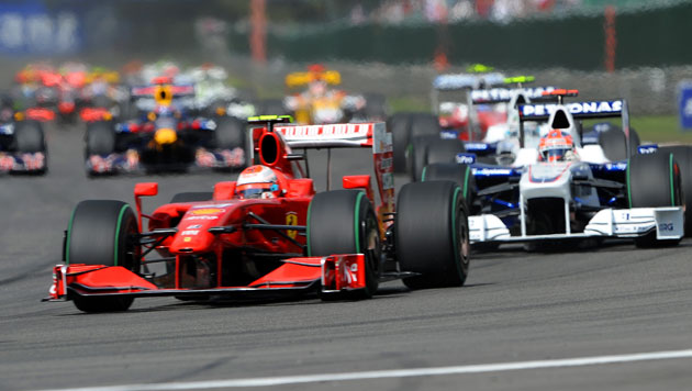 Belgian Grand Prix: Ferrari's Kimi Raikkonen drives ahead of BMW Sauber's Robert Kubica