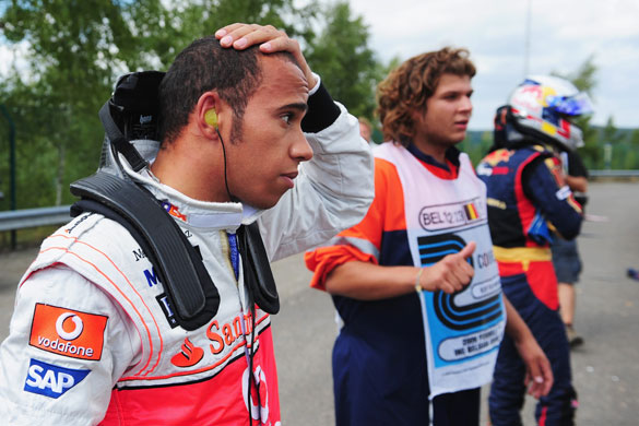 Belgian Grand Prix: Lewis Hamilton looks disappointed after colliding with Jaime Alguersuari