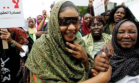Lubna Hussein is greeted by supporters outside the court in Khartoum