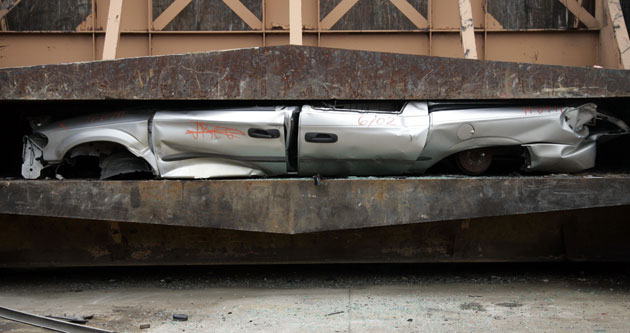 24 hours in pictures : Cash for Clunkers program in Detroit