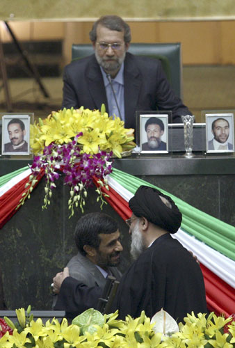 Ahmadinejad inauguration: Mahmoud Ahmadinejad is congratulated by Judiciary Chief Hashemi Shahroudi