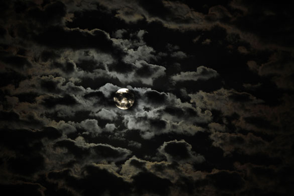 5 August 2009: Tijuana, Mexico: The moon is covered by clouds