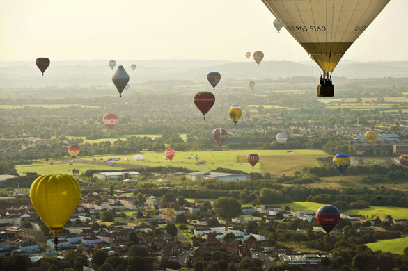 Bristol balloon festival: Hot air balloons float towards the Hengrove area of Bristol