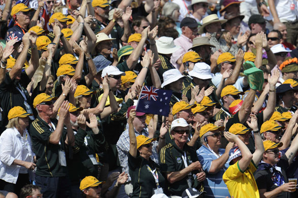 Tom Ashes 4th test day 2: Jubilent Aussie fans wave their flags as they pass 300.