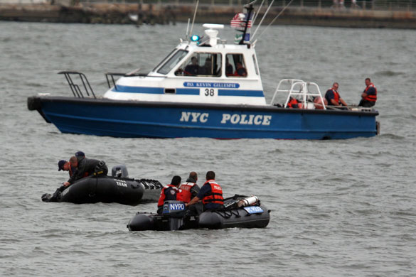 hudson river crash: helicopter collides with small plane over hudson river