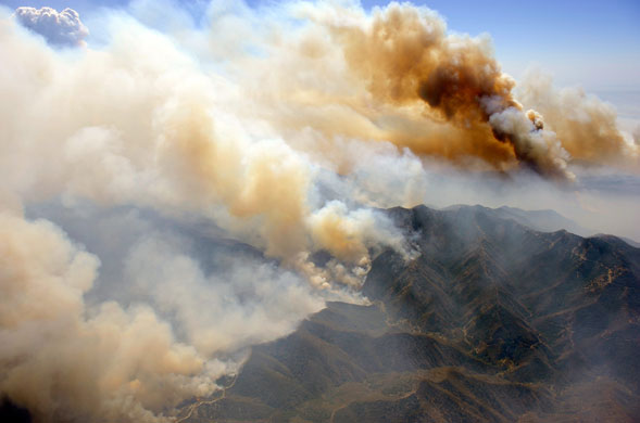 California wildfires: Mushrooming clouds rise to sky
