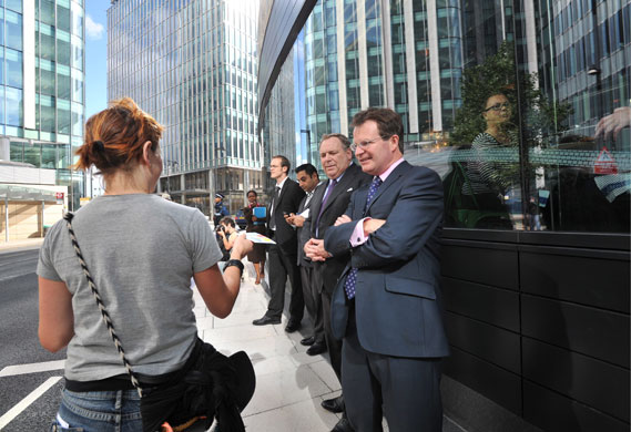 Climate camp: 28 August: An environmental protesters leaflets some office workers 