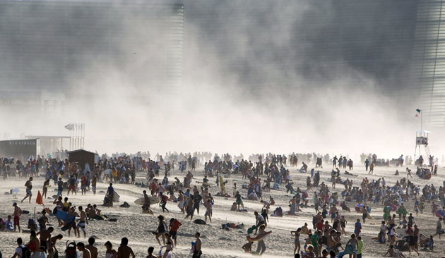 1 September 2009: San Sebastia, Spain: People abandon La Zurriola beach