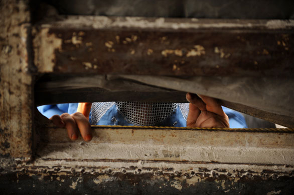 1 September 2009: Kabul, Afghanistan: A displaced woman asks for donations