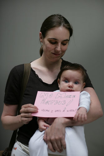 10:10 launch pledges: Margaret Remana and Zafirah hold their 10:10 pledge
