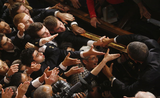 Barack Obama healthcare: Barack Obama is greeted on Capitol Hill after delivering a speech