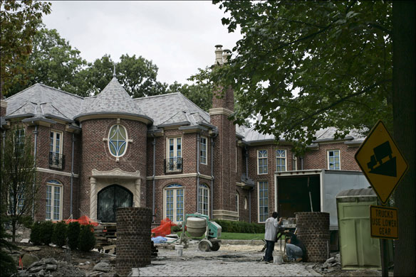 Alpine New Jersey: Maintenance workers at one of the many mansions in Alpine