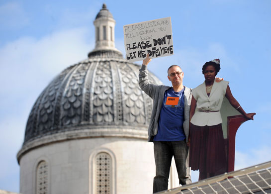 Flickr plinth watch: Brian Capaloff on the fourth plinth with a cardboard cutout of Linda Carty