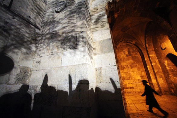 24 hours in pictures: Jerusalem: An ultra-Orthodox Jewish man walks through the Jaffa Gate