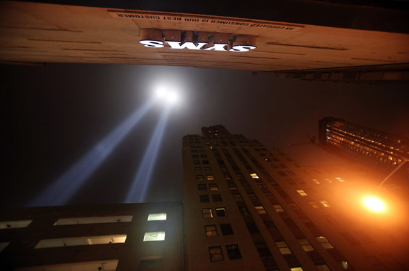 24 hours in pictures: New York City, US:  The Tribute in Light near the World Trade Centre site 