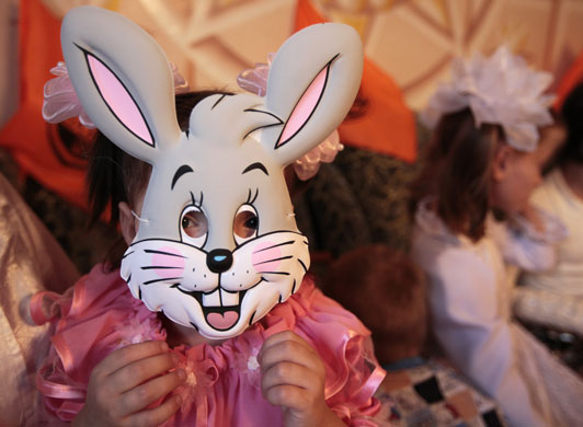 24 hours in pictures: Makeyevka, Ukraine: Children in an orphanage prepare to welcome Elton John 