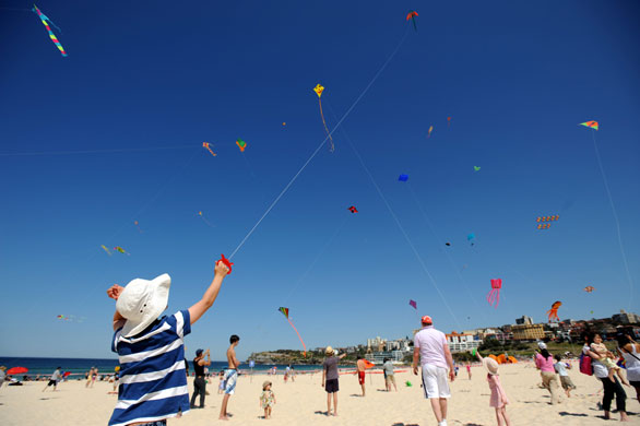 24 hours in pictures: Sydney, Australia: Kites fly at Bondi Beach for the Festival of the Winds